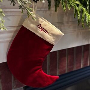 Pottery Barn Red and Cream Holiday Stocking. LOGAN